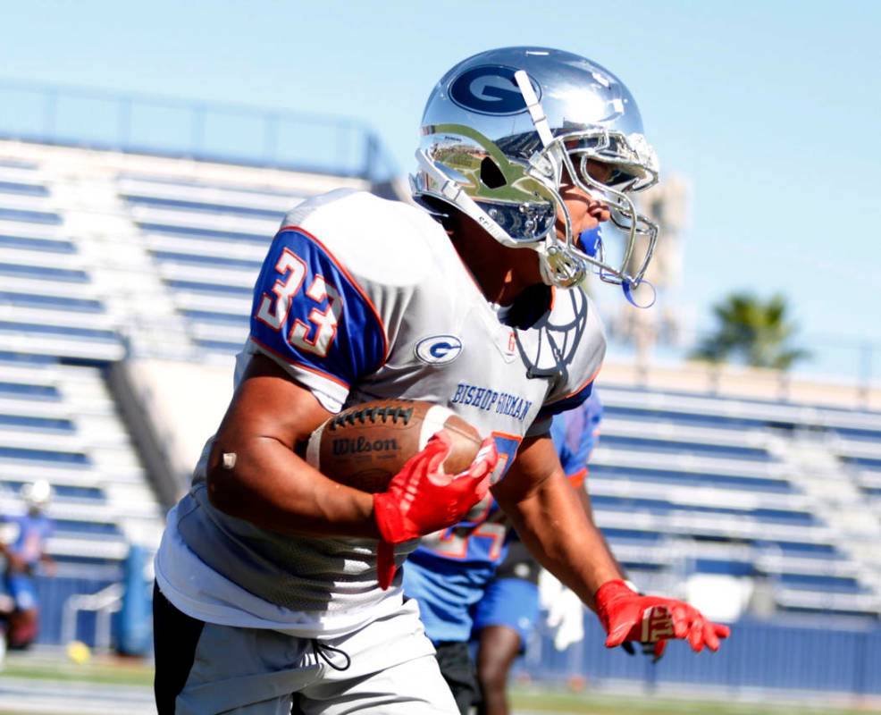 Bishop Gorman's running back Jahsai Shannon (33) participates in a drill during practice at Bis ...