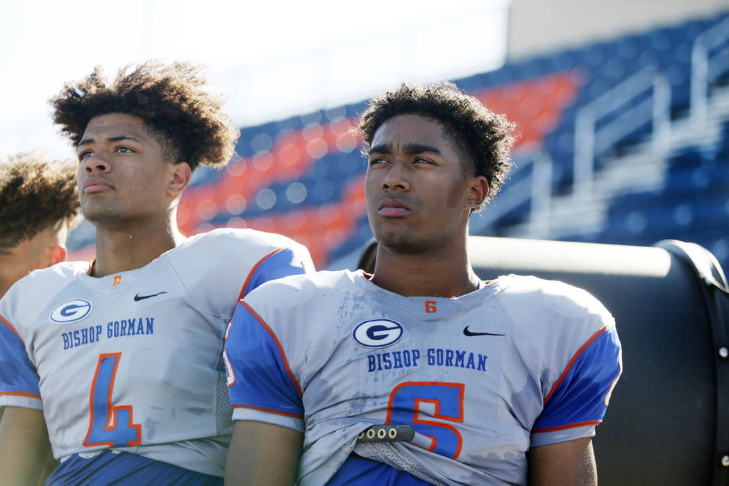 Bishop Gorman's wide receiver Rome Odunze (4), and running back Ikaika Ragsdale (6) watch a dri ...