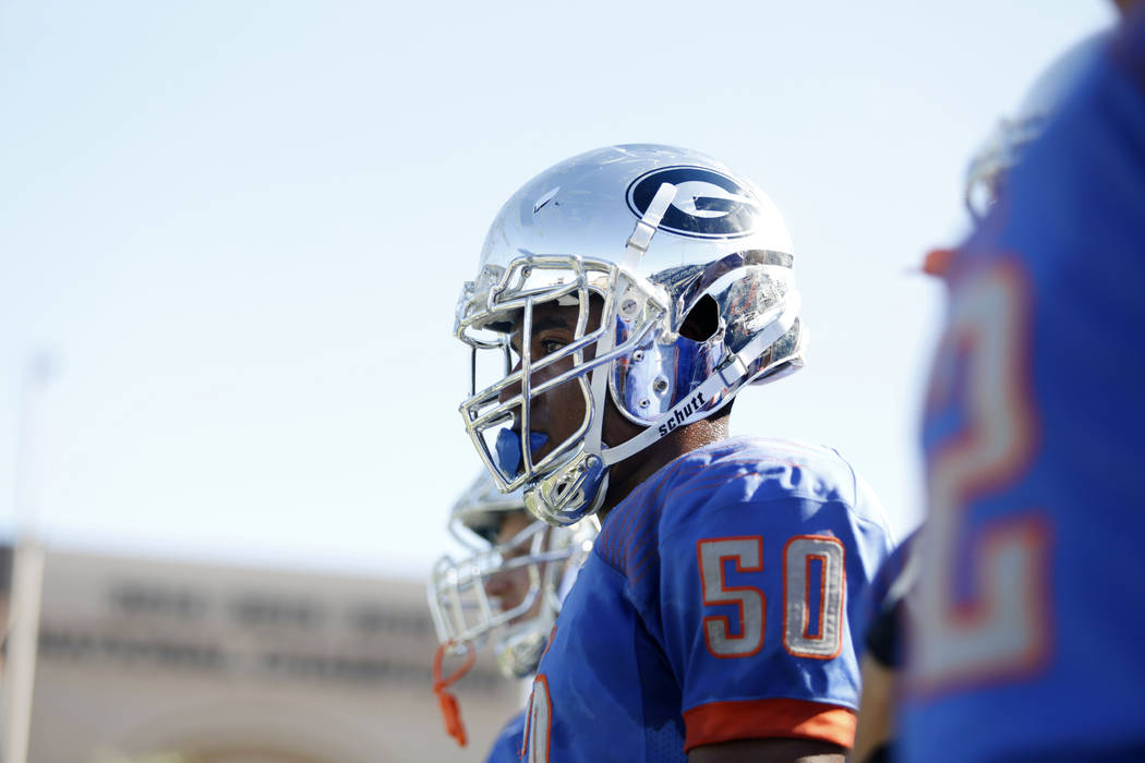 Bishop Gorman's defensive lineman Jordan Nelson (50) watches a drill during practice at Bishop ...