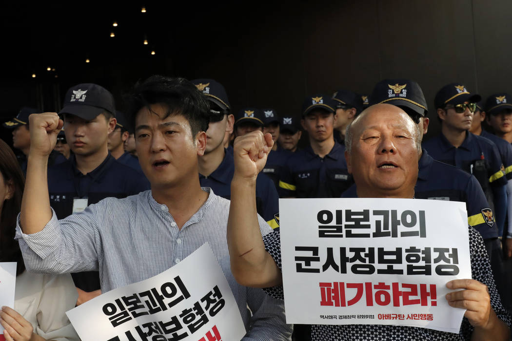 South Korean protesters shout slogans during a rally demanding the South Korean government to a ...