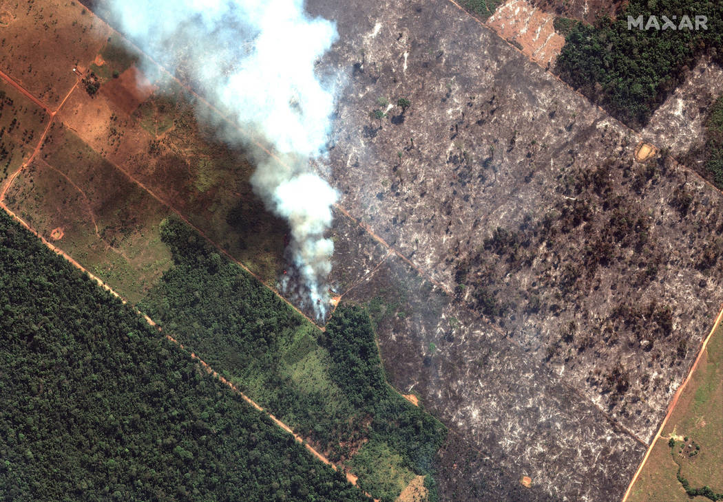 This Aug. 15, 2019 satellite image from Maxar Technologies shows closeup view of a fire southwe ...