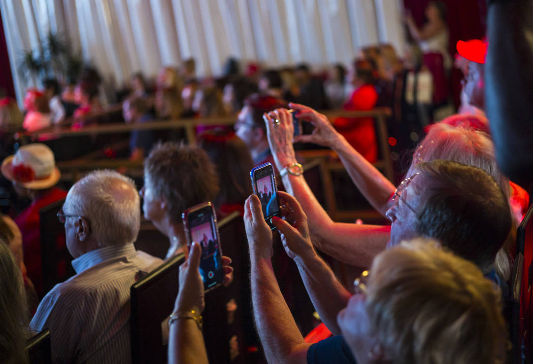 Supporters take pictures as Kimberly Guilfoyle, senior advisor for Donald Trump's 2020 campaign ...