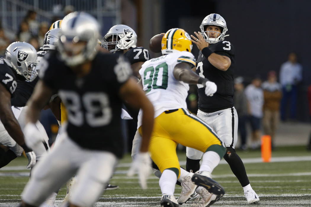 Oakland Raiders quarterback Nathan Peterman (3) throws a pass against the Green Bay Packers dur ...