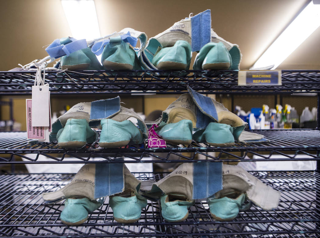 Shoes on a rack in the wardrobe are for Cirque du Soleil's "O" at the Bellagio in Las ...