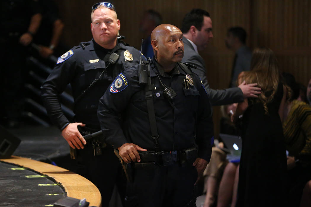 Clark County School District police officers keep watch during a heated CCSD board meeting to d ...
