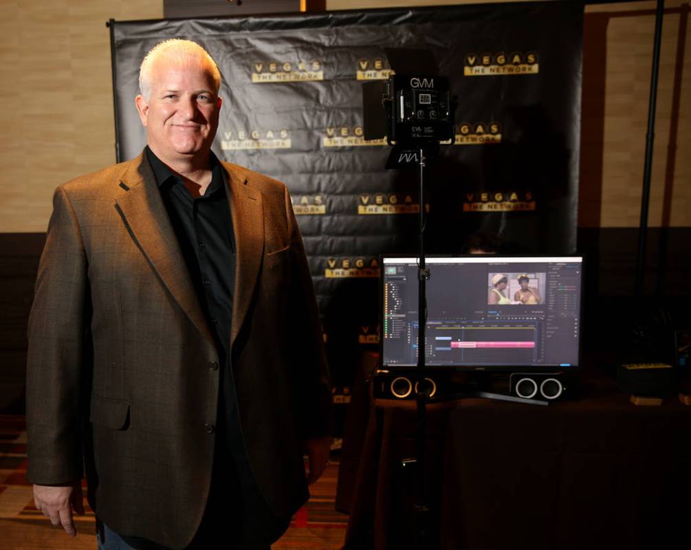 Kenneth Johnson of Vegas the Network at his booth before the Start Tank entrepreneurship compet ...