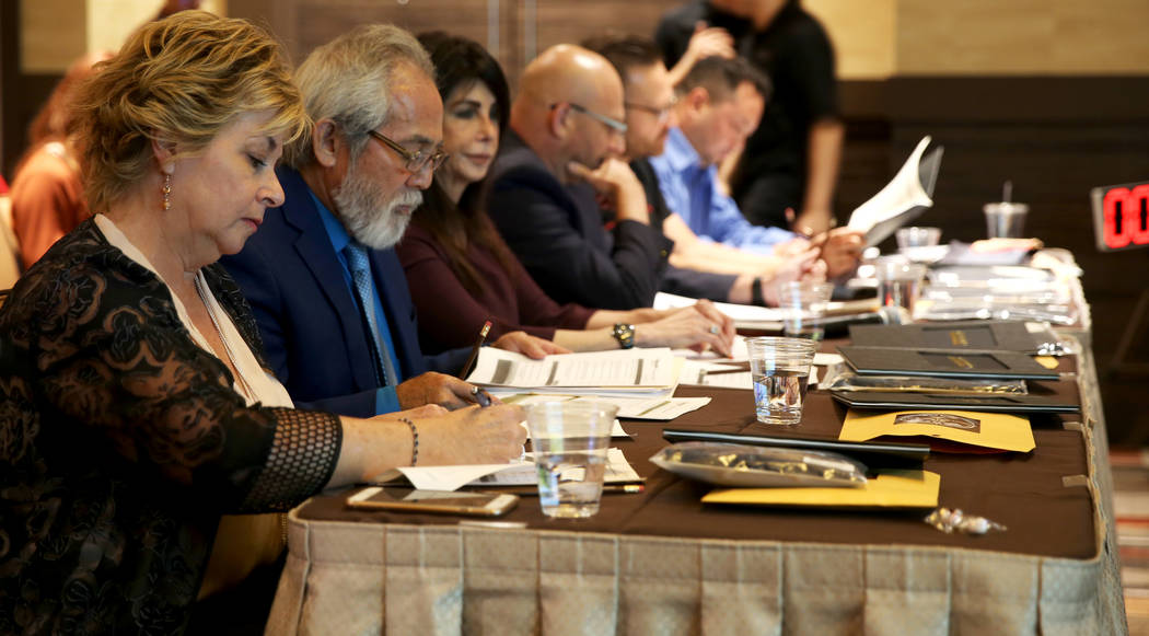 Judges, from left, Vickie Shields, provost and executive vice president at Nevada State College ...