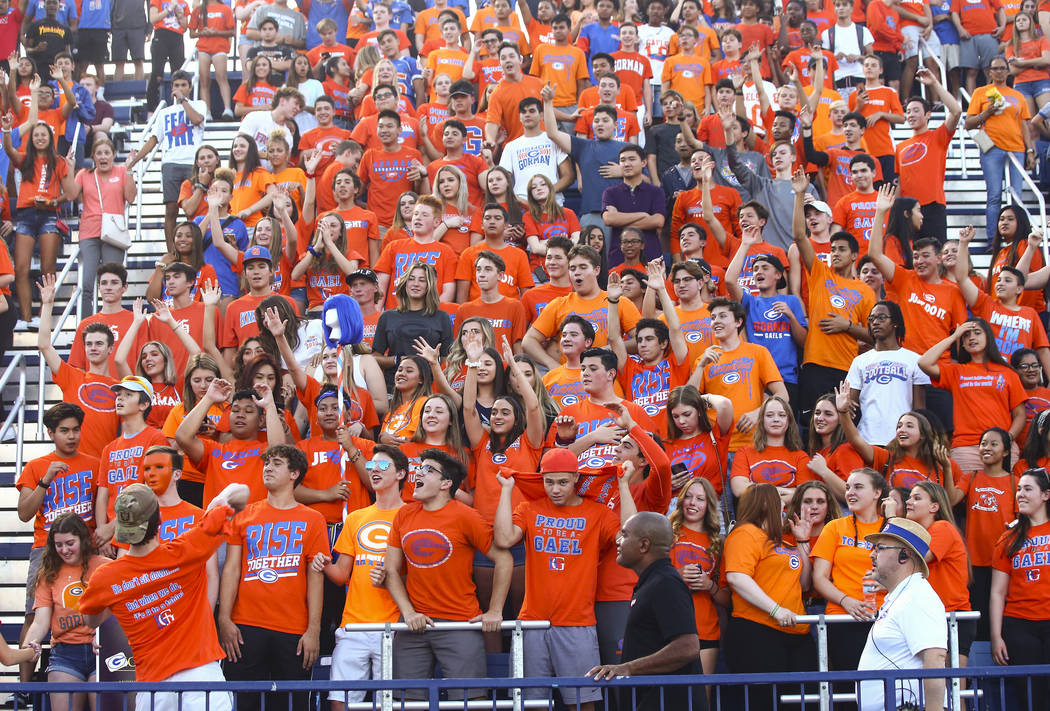 Bishop Gorman students cheer before the start of a football game against Orem at Bishop Gorman ...