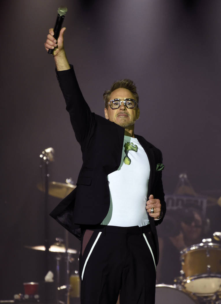 Actor Robert Downey Jr. addresses the crowd before the Rolling Stones concert at the Rose Bowl, ...