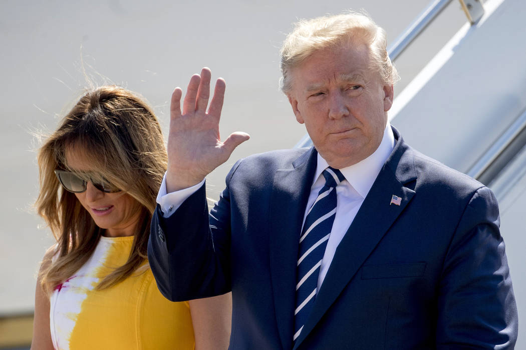 U.S President Donald Trump and first lady Melania Trump arrive in Biarritz, France, Saturday, A ...