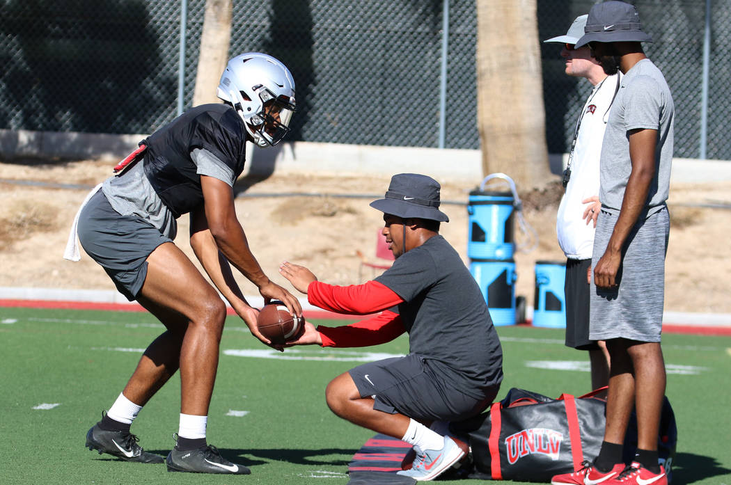 UNLV Rebels quarterback Armani Rogers (1) during a drill at team practice on Tuesday, Aug. 13, ...