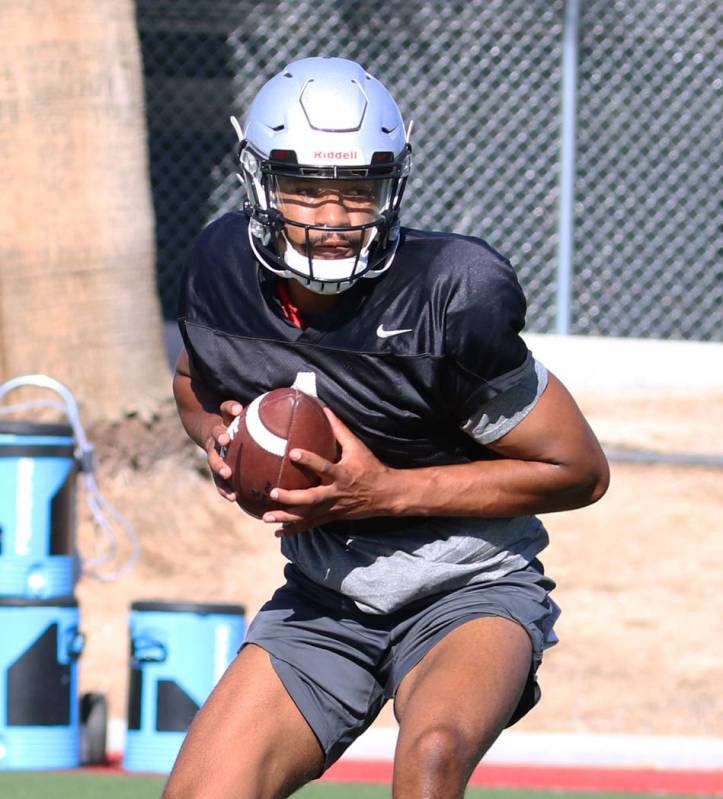 UNLV Rebels quarterback Armani Rogers (1) during a drill at team practice on Tuesday, Aug. 13, ...