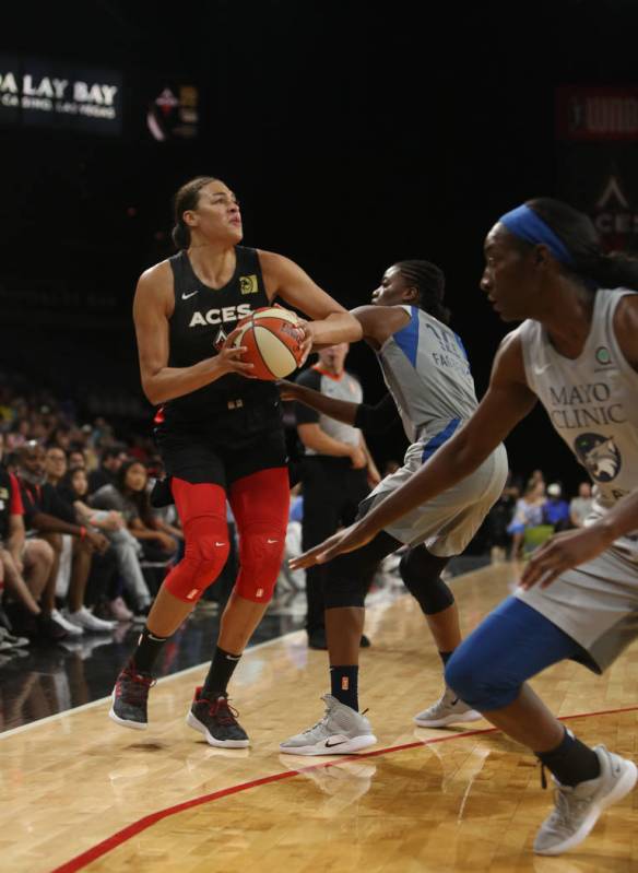 Las Vegas Aces center Liz Cambage (8) attempts a three pointer against Minnesota Lynx center Te ...