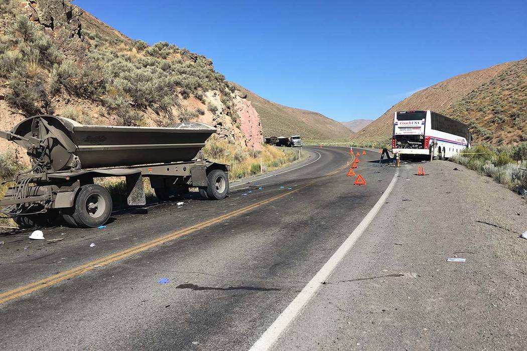 Two people were killed after a semitractor-trailer crashed head-on into a bus Saturday, Aug. 24 ...