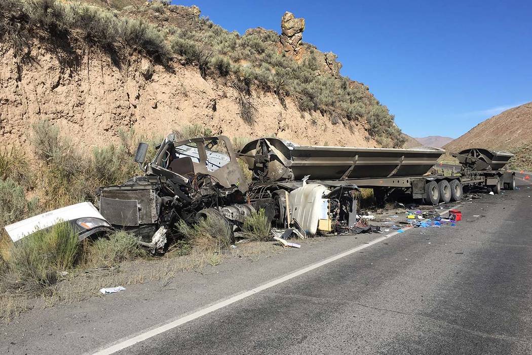 Two people were killed after a semitractor-trailer crashed head-on into a bus Saturday, Aug. 24 ...