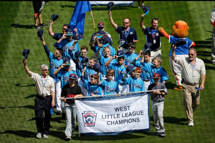 The Mountain Ridge Little League baseball team from Las Vegas participates in the opening cerem ...