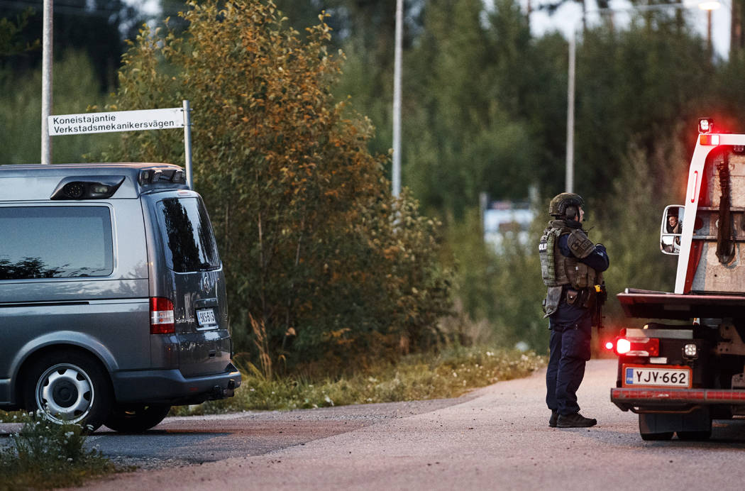 Police investigate an incident in an industrial area near Porvoo, Finland, early Sunday Aug. 25 ...