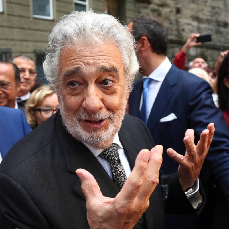 Placido Domingo talks to fans at the 'Festspielhaus' opera house after he performed 'Luisa Mill ...