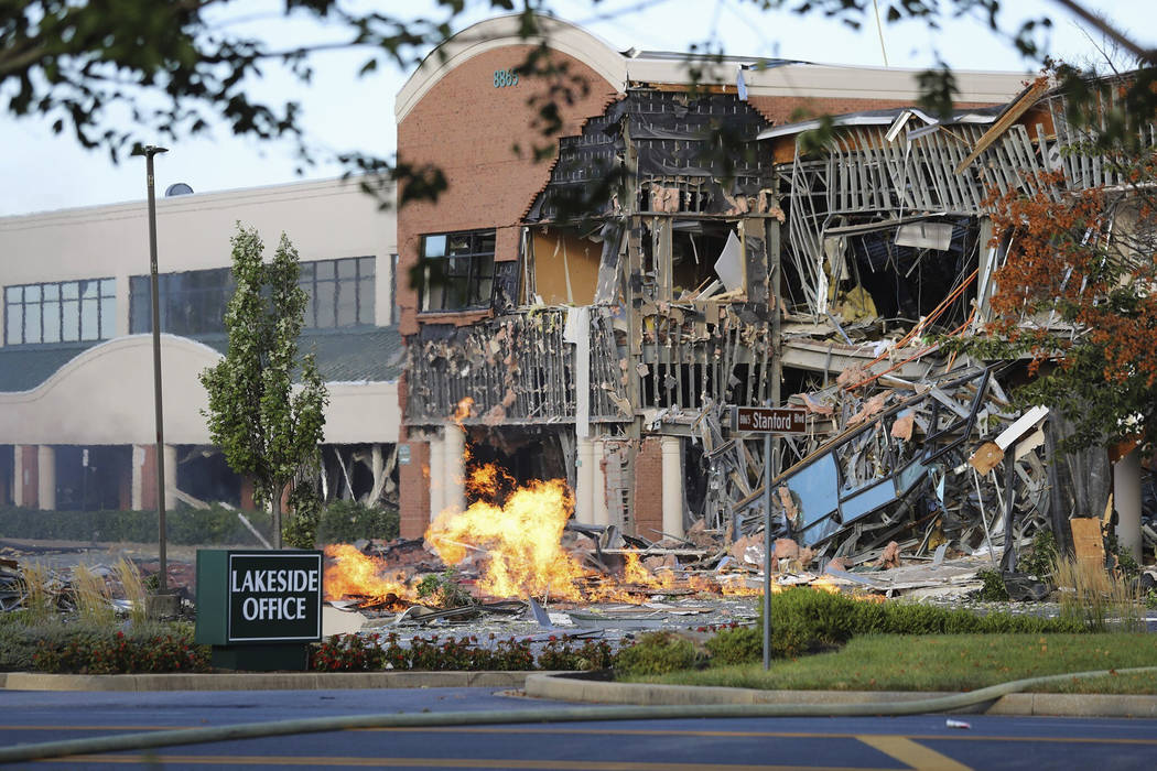 This photo provided by the Howard County Fire And Rescue shows the scene of a damaged building ...