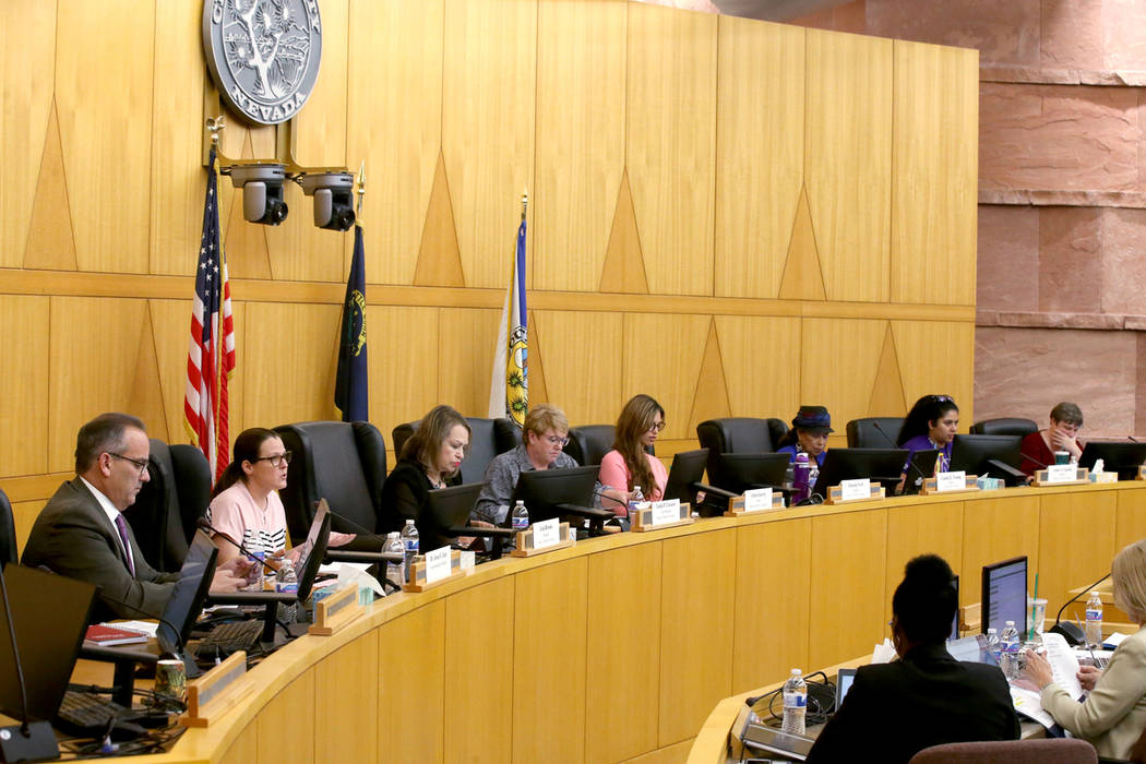 Clark County School District Superintendent Dr. Jesus Jara, left, and members of the CCSD Schoo ...