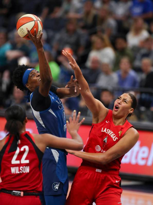Minnesota Lynx center Sylvia Fowles (34) loses control of the ball after running into the defen ...