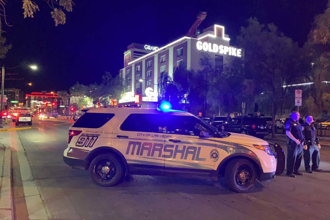 A large law enforcement presence is visible on Thursday, Aug. 22, 2019, in downtown Las Vegas, ...