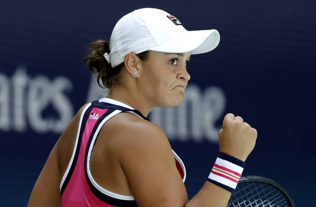 Ashleigh Barty, of Australia, reacts after winning a point against Zarina Diyas, of Kazakhstan, ...