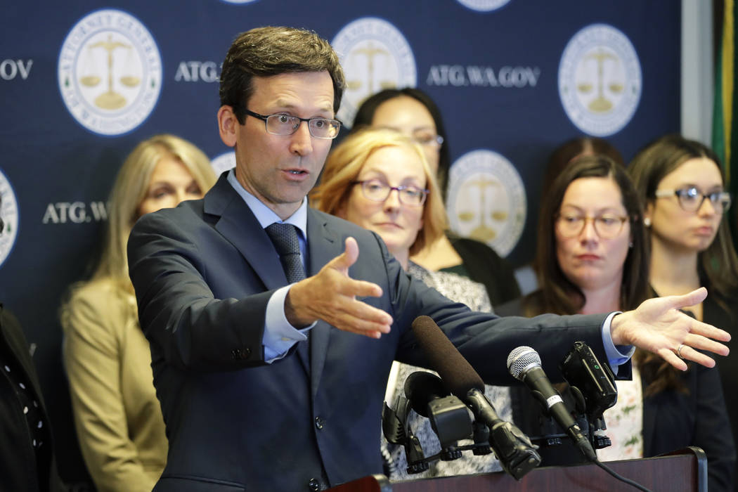 Washington Attorney General Bob Ferguson talks to reporters, Monday, Aug. 26, 2019, during a ne ...