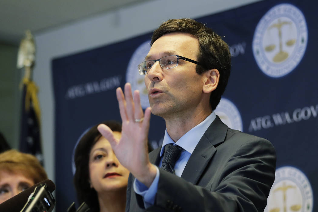 Washington Attorney General Bob Ferguson talks to reporters, Monday, Aug. 26, 2019, during a ne ...