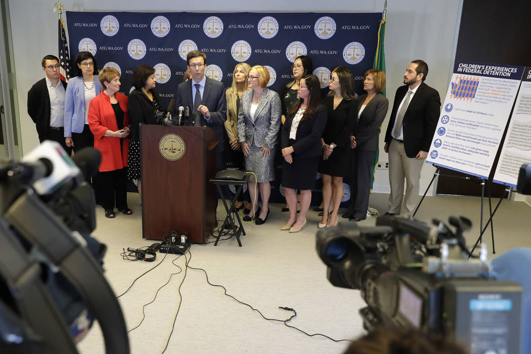 Washington Attorney General Bob Ferguson talks to reporters, Monday, Aug. 26, 2019, during a ne ...