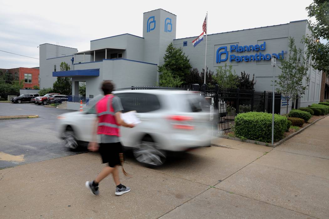 In a June 21, 2019, file photo, a motorist enters Planned Parenthood of the St. Louis Region an ...