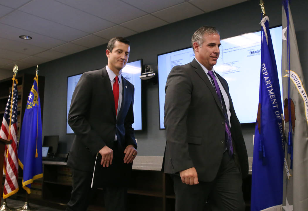 U.S. Attorney Nicholas Trutanich, left, and Ray Johnson, assistant special agent in charge of t ...