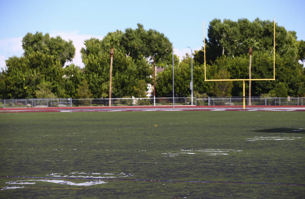 A view of the deteriorating turf at the football field at Valley High School in Las Vegas on We ...