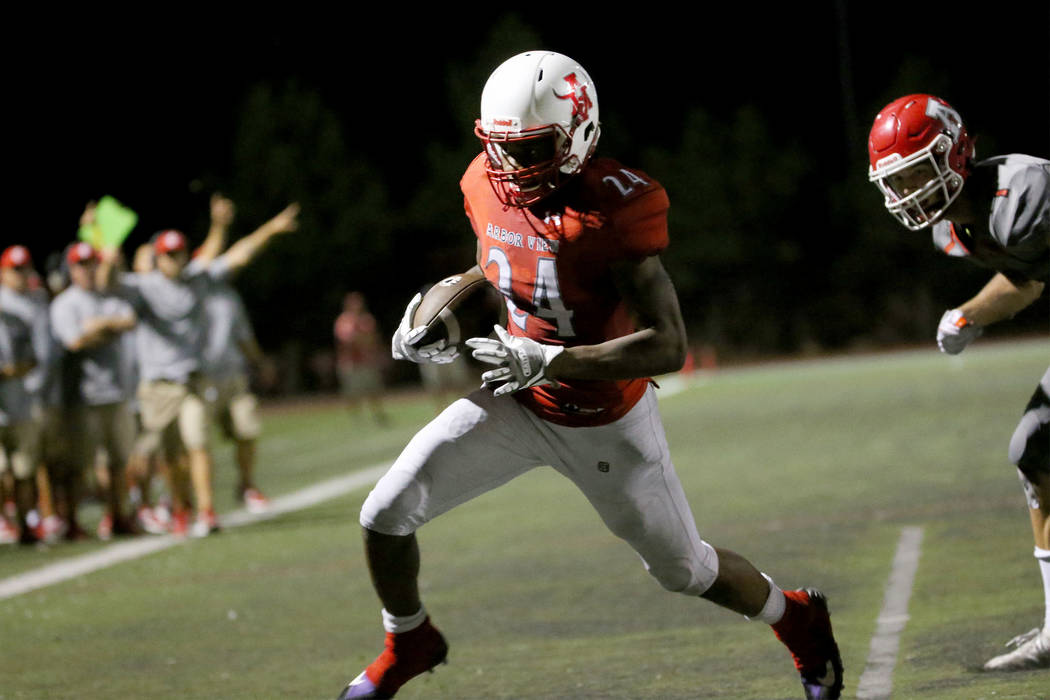 Arbor View's Daniel Mitchell (24) runs the ball for a touchdown against American Fork's Taylor ...