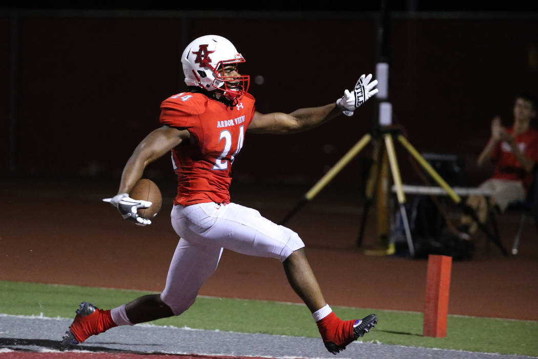 Arbor View's Daniel Mitchell (24) celebrates his touchdown run against American Fork in the sec ...