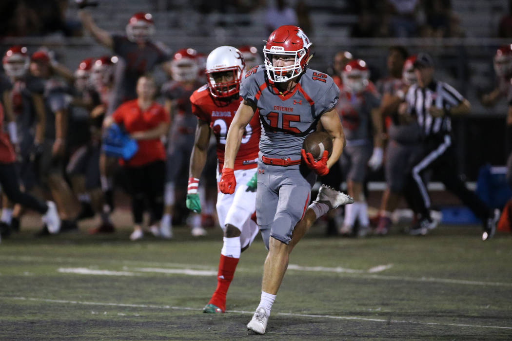 American Fork's Devin Downing (15) runs for a touchdown with Arbor View's Rickie Davis (20) fol ...