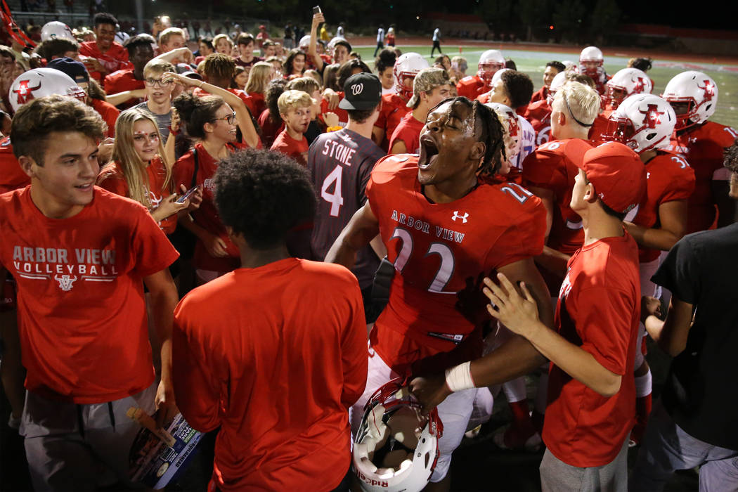 Arbor View's Zavier Alston (22) celebrates a win against American Fork in the football game at ...
