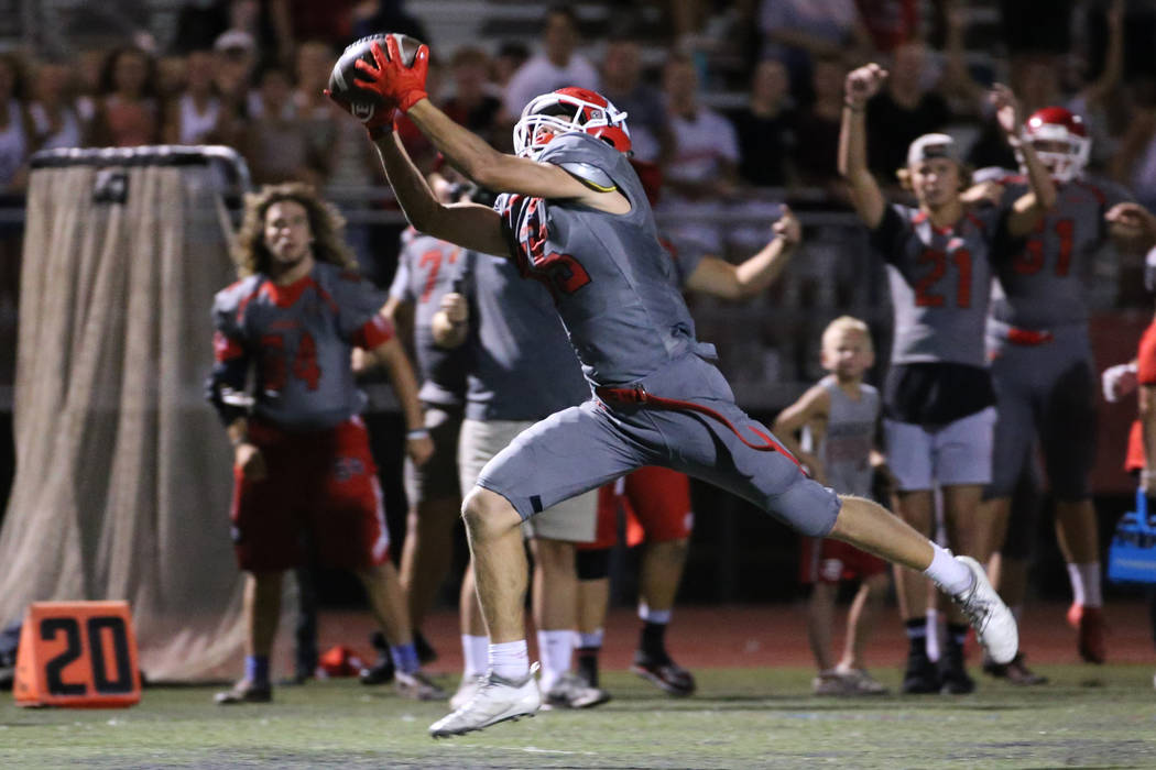 American Fork's Devin Downing (15) makes a catch before running for a touchdown in the fourth q ...