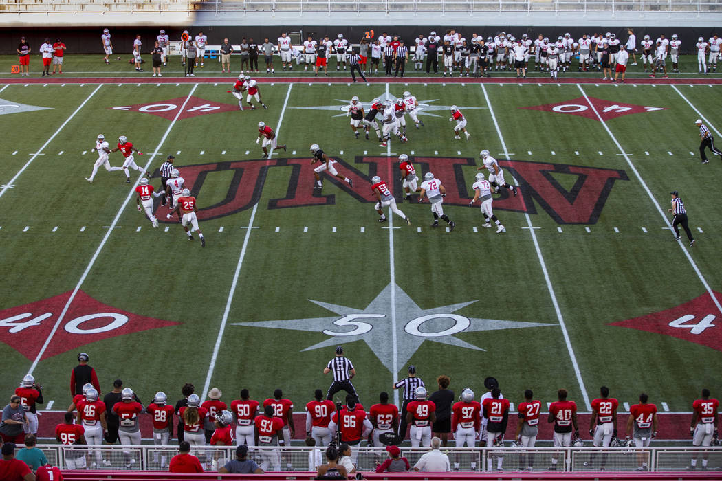 UNLV QB Armani Rogers (1) breaks free for a long run during their first major scrimmage of foot ...