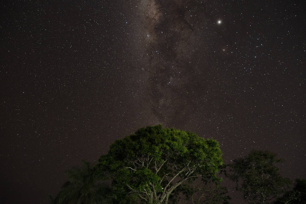 In this time exposure, stars fill the sky over Bau village located on Kayapo indigenous territo ...