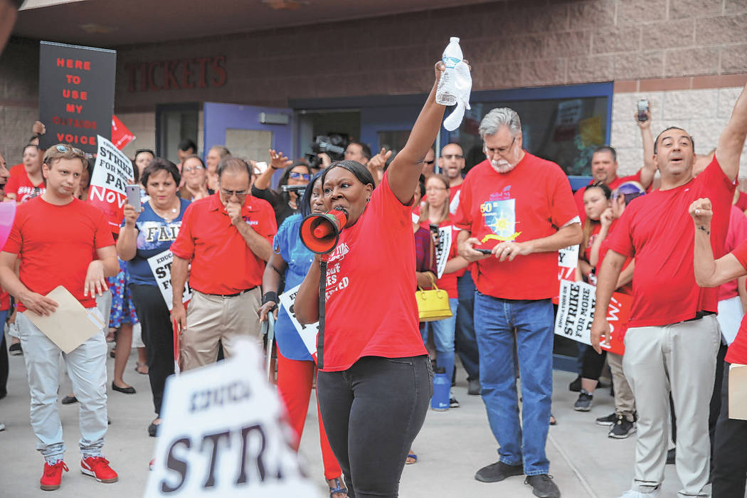 Linda Jones of Clark County Education Association, center, rallies the crowd after a Clark Coun ...