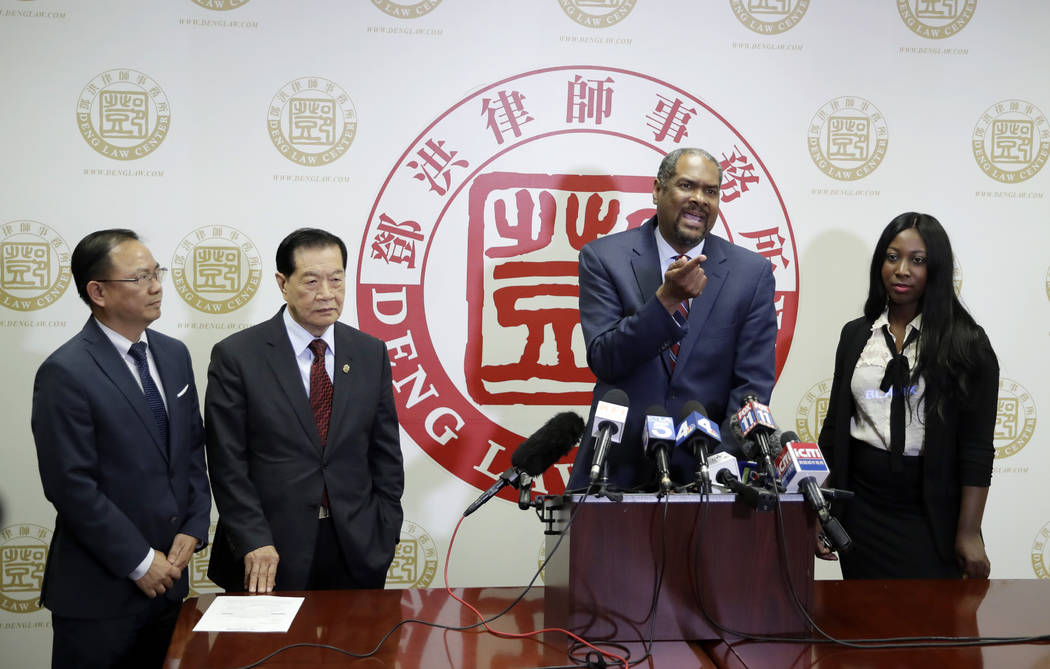 From left, attorney Daniel Deng, forensic scientist Henry Lee, attorney Brian Dunn, and Mary Es ...