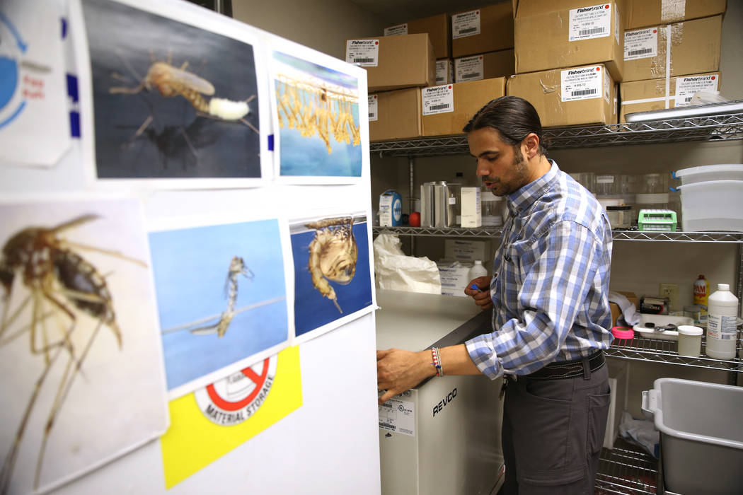 Vivek Raman, an environmental health supervisor for the Southern Nevada Health District, retrie ...