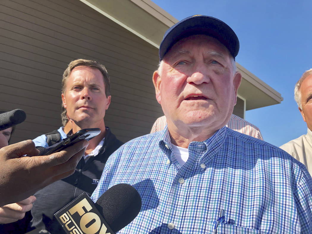 U.S. Agriculture Secretary Sonny Perdue speaks to reporters at an Ag Policy Summit during a vis ...