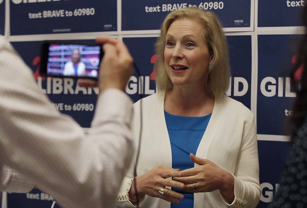 Democratic presidential candidate Sen. Kirsten Gillibrand, D-N.Y., speaks to a reporter after a ...