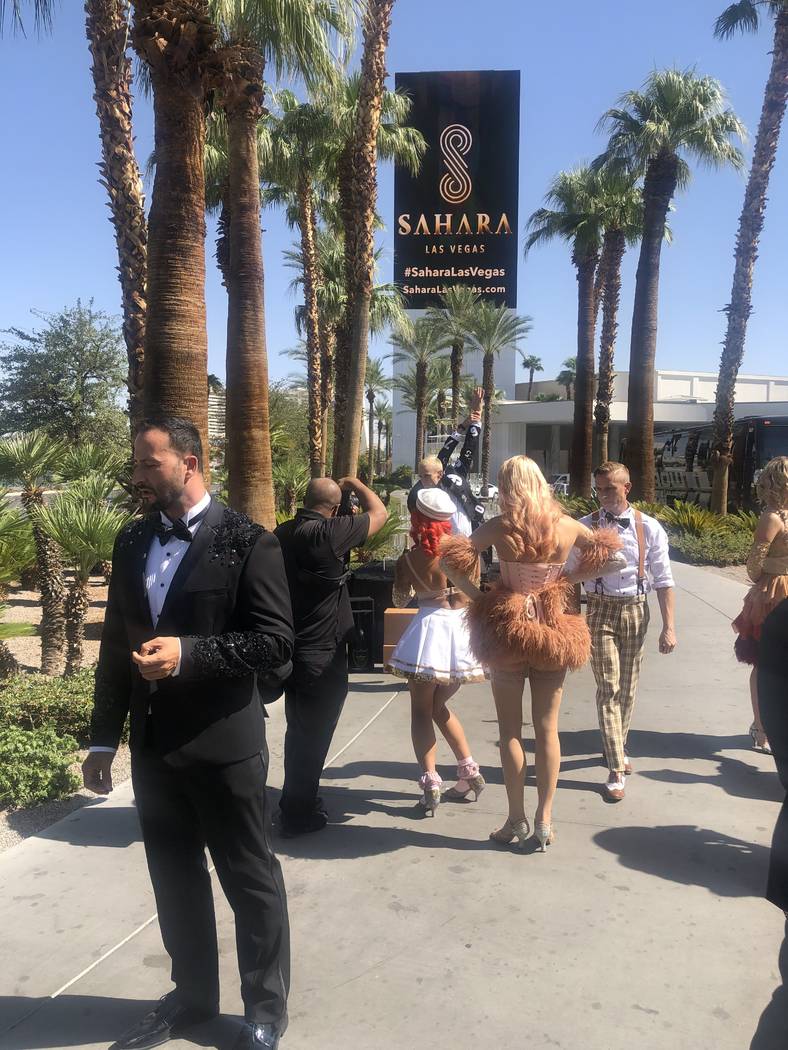 The cast of "Blanc de Blanc is shown at the Sahara Las Vegas sign on Thursday, Aug. 29, 2019. ( ...