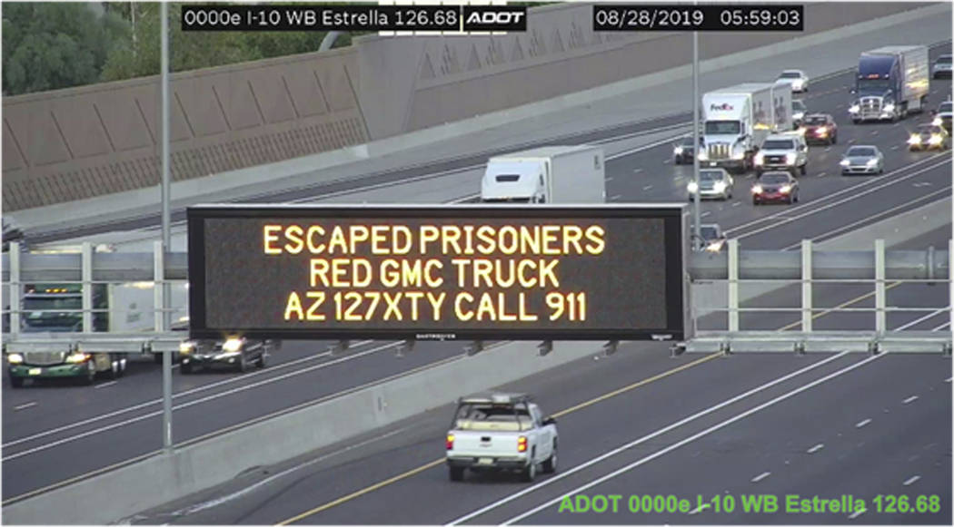 This photo from an Arizona Department of Transportation remote camera shows a digital sign ove ...