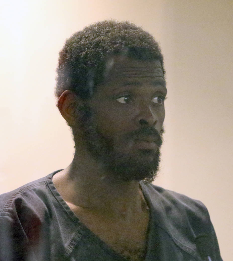 Clinton Taylor, accused of killing a woman with a sledgehammer, appears in court at the Regiona ...