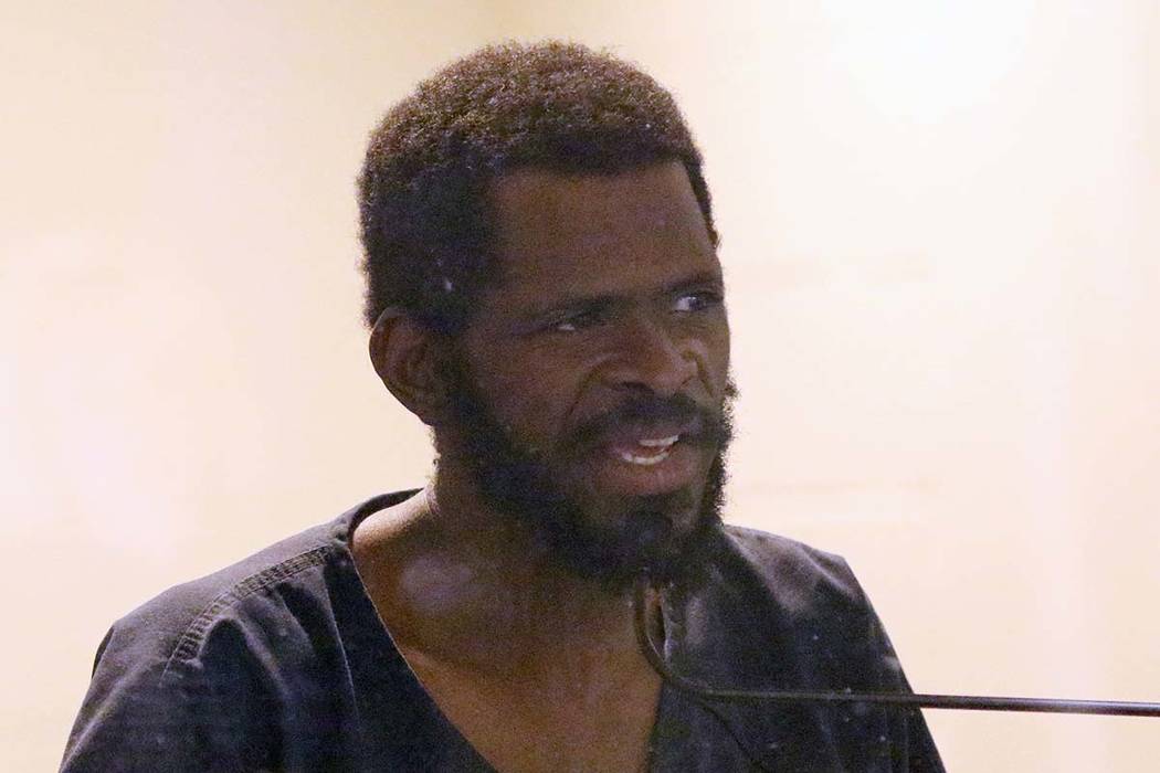 Clinton Taylor, accused of killing a woman with a sledgehammer, addresses the court during his ...