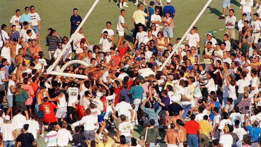 Missouri Tigers fans storm the field after defeating University of Illinois in 1991. (Jeff Robe ...